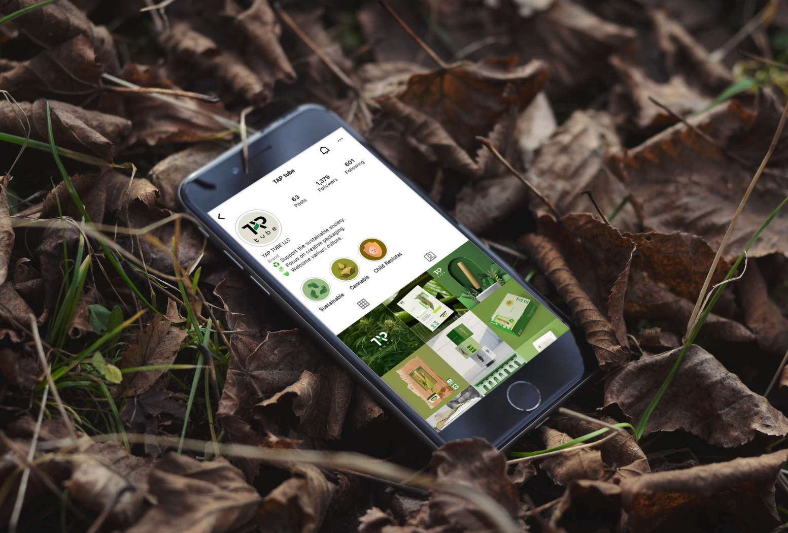 TAP tubes social media profile and post grid shown on a phone in a natural setting